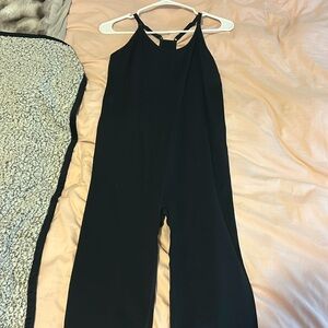 Brand new only worn 2 times. Black seamless workout onesie.